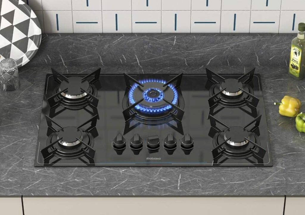 Melhor cooktop 5 bocas com queimador central aceso.